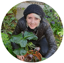 Marianne Hazlewood in the garden with Arisaema griffithii