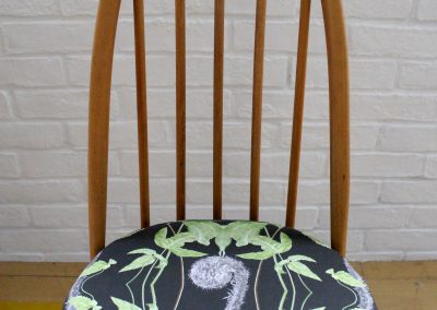 Ercol seat pad in Dryopteris Dark Fern Grey on denim